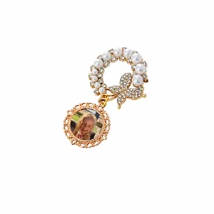 Elegant pearl butterfly rhinestone photo frame brooch pin for custom pictures and gifts.
