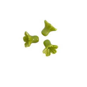 Green shell powder trumpet flower loose beads through-hole DIY jewelry craft accessories.
