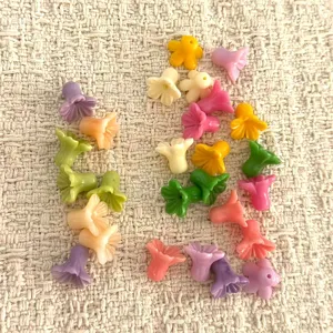 Colorful trumpet flower loose beads detail view, perfect for DIY jewelry making and hair accessories.