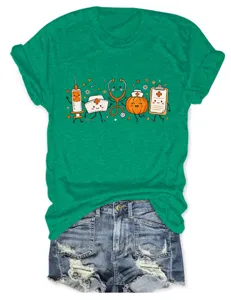 Green short sleeve t-shirt with cute medical cartoon print and casual denim shorts outfit.