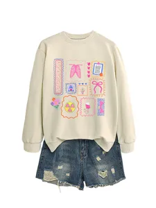 Women's casual long sleeve crewneck sweatshirt with radiology graphic and matching denim shorts.
