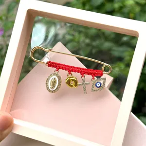 Red braided rhinestone brooch safety pin with evil eye cross and religious charms for women