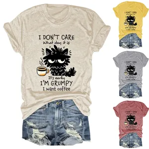 Casual funny women's short sleeve crewneck t-shirt with cute grumpy cat coffee graphic detail.