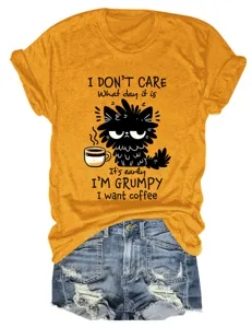 Casual cute women yellow short sleeve graphic t-shirt featuring a funny grumpy cat and coffee.