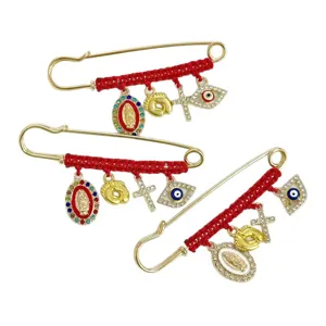 Red string rhinestone safety pin brooch with evil eye cross and religious charms for women
