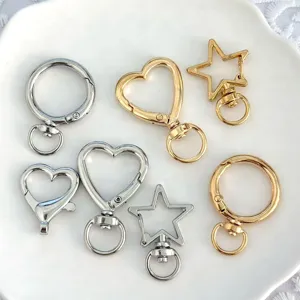 Assorted metal keychain clips, heart star round spring hooks for DIY jewelry making.
