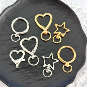 Gold and silver alloy heart star round keychains DIY craft metal clasps detail view