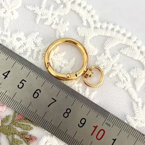 Round alloy keychain spring clasp detail shot, perfect for DIY jewelry making and bag charms.