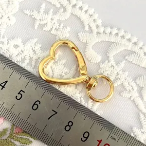 Gold heart shaped lobster clasp detail view for DIY handmade jewelry crafts making accessory
