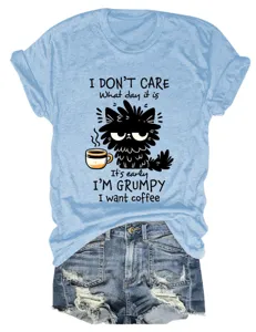 Detail view of a light blue casual women short sleeve t-shirt featuring grumpy cat coffee graphic print.