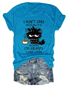 Casual funny women short sleeve t-shirt featuring cute grumpy black cat coffee graphic.