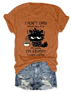 Casual women's short sleeve t-shirt featuring a funny grumpy cat coffee graphic design.