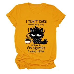 Casual women's mustard yellow short sleeve t-shirt featuring a funny grumpy cat coffee print.