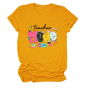 Close-up view of the yellow teacher graphic t-shirt chest print and soft fabric details.
