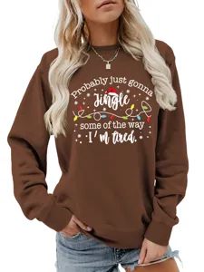 Detailed view of brown Christmas graphic sweatshirt featuring festive text and lights design.
