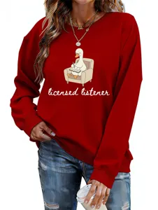 Detailed close-up view of the red long sleeve sweatshirt featuring cute duck graphic and text.