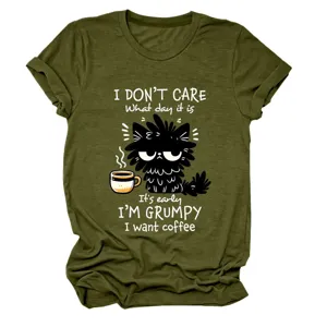 Close-up detail of the funny grumpy cat print and slogan on the casual green fabric.