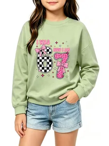 Detailed shot of kids casual crewneck sweatshirt featuring unique graphic numbers and ribbed trim.