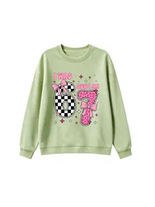 Kids green sweatshirt detail showing the cute pink bow and 67 birthday graphic print.