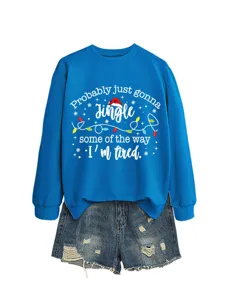 Detailed view of the blue long-sleeve sweatshirt with festive holiday slogan graphic.