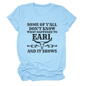 Close up detail of light blue short sleeve t-shirt with funny text quote and skull graphic.
