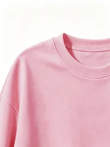 Close-up view of kids solid pink crewneck sweatshirt collar detail, soft fabric apparel.