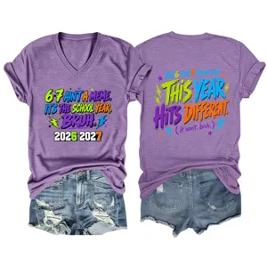 Detail view of purple v-neck short sleeve t-shirt featuring fun school year graphic prints.