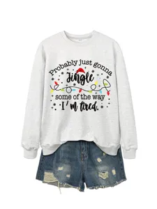 Women's casual long sleeve crewneck sweatshirt paired with stylish distressed denim shorts.