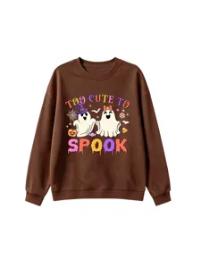 Close-up detail of the Halloween ghost graphic and soft fabric texture on the brown sweatshirt.