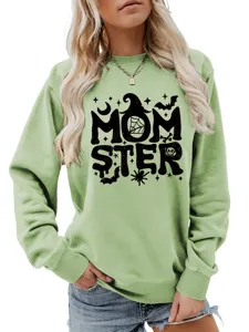 Lässiger stilvoller Damen Pullover in Grün mit lustigem Halloween Monster Motiv und langen Ärmeln.