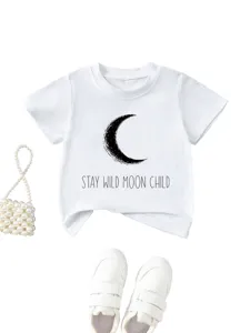 Kids short sleeve white t-shirt featuring moon print and stylish stay wild graphic text.