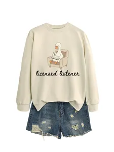 Casual cute cartoon duck graphic crewneck sweatshirt paired with stylish denim shorts for women.