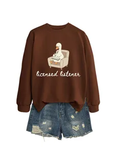 Detailed view of the brown long-sleeve sweatshirt and ripped denim shorts outfit design.