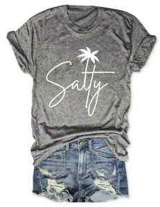 Casual grey short-sleeve t-shirt with Salty palm tree graphic print paired with denim shorts.