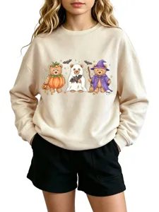 Detail view of the beige crewneck sweatshirt showcasing the cute Halloween three bears print.
