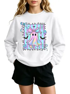 Children trendy iridescent bow ghost graphic sweatshirt for casual autumn wear detail view.