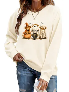 Dettaglio felpa da donna con stampa carina di mucca Highland di Halloween in beige.