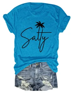 Casual women's blue short sleeve crewneck t-shirt with salty palm tree print and denim shorts.
