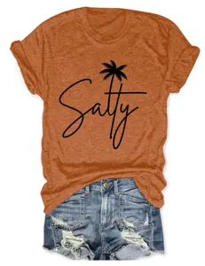 Casual women's short-sleeve t-shirt featuring a salty palm tree graphic print detail.