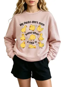 Cute duck graphic print crewneck sweatshirt for women, casual pink long sleeve pullover top.
