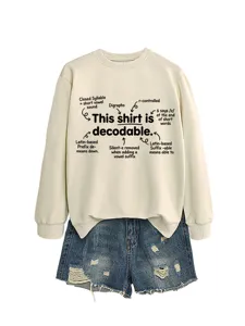 Detailed view of the casual long-sleeve beige sweatshirt featuring educational English text.