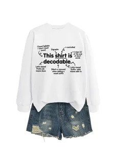 Casual white educational print long sleeve sweatshirt detailed view with denim shorts.