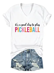 Detailed closeup view of white V-neck short sleeve T-shirt featuring pickleball graphic print.