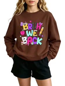 Detailed view of brown sweatshirt featuring playful back to school graphic print and long sleeves.