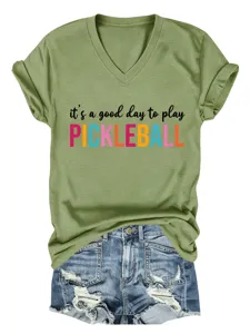 Casual women's olive green V-neck short sleeve t-shirt with pickleball graphic print.