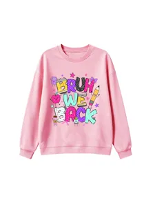 Detailed view of the pink sweatshirt featuring the colorful bruh we back cartoon print.