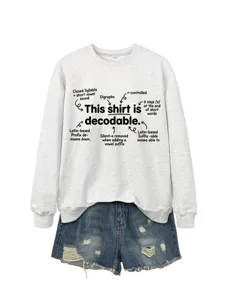 Casual grey long sleeve women sweatshirt with funny English phonics text print and blue denim shorts.