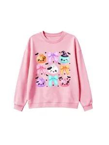 Joli sweat-shirt rose pour enfants avec des boulettes et des nœuds colorés pour la saison.