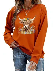 Casual women's orange long sleeve sweatshirt featuring a cute highland cow floral graphic print.