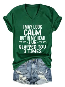 Dark green V-neck short sleeve t-shirt with funny quote graphic detail view for women.